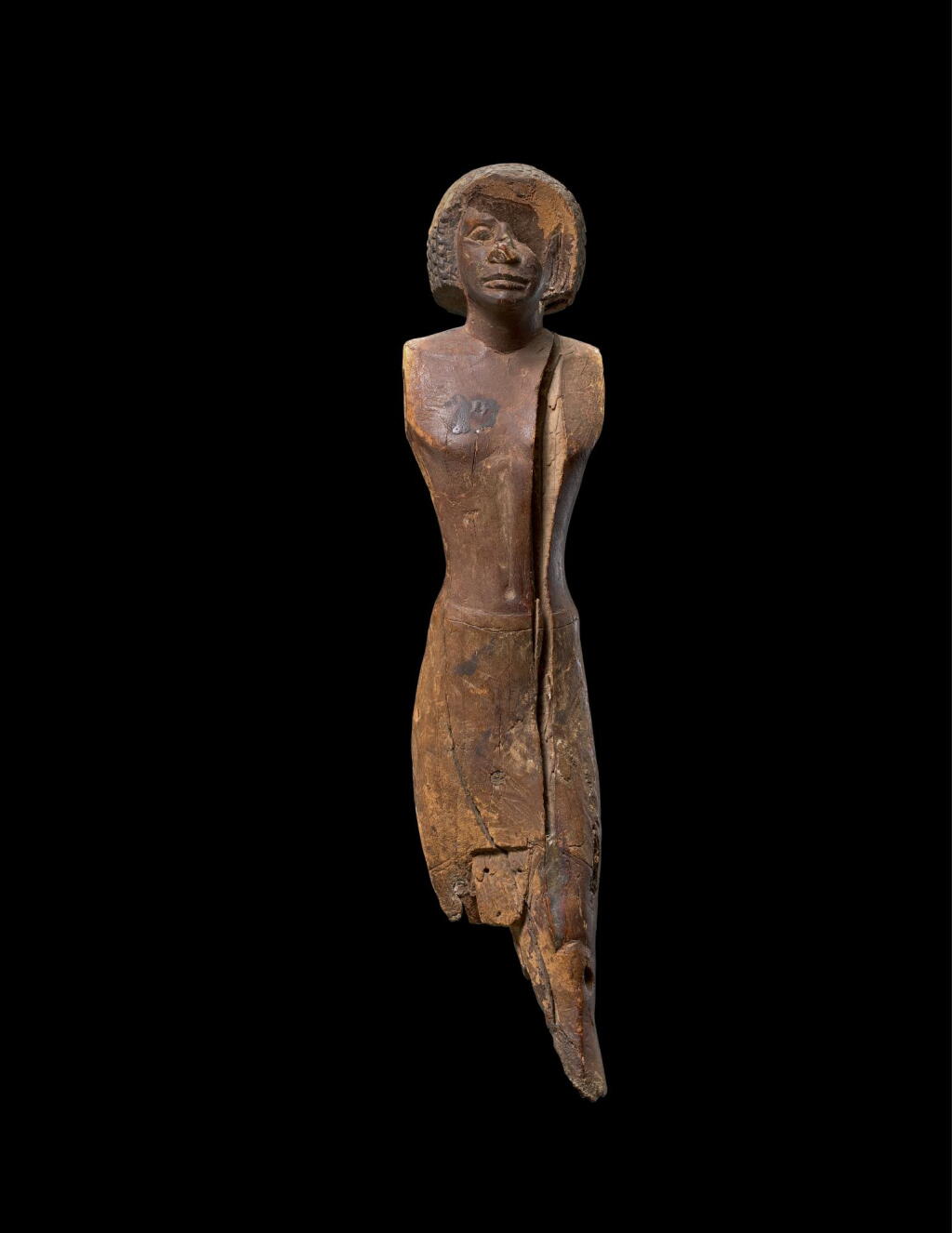 View full screen - View 1 of Lot 265. AN EGYPTIAN WOOD FIGURE OF A MAN, 5TH/6TH DYNASTY, 2520-2195 B.C..