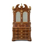 An Italian parcel-gilt, rosewood and marquetry bureau cabinet, Rome, third quarter 18th century