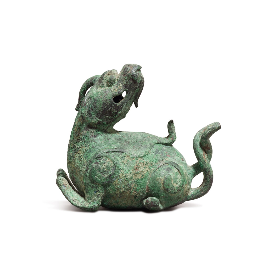 View full screen - View 1 of Lot 5829. A bronze 'mythical beast' waterpot, Ming dynasty or earlier | 明或更早 青銅瑞獸水丞.