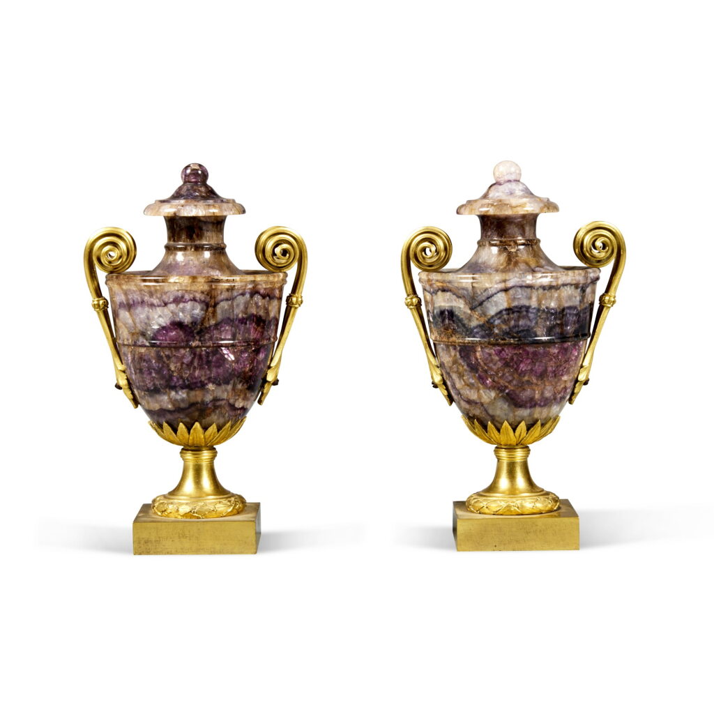 View full screen - View 1 of Lot 126. A Pair of George III Gilt-Metal Mounted Derbyshire Blue John Vases, after designs by Zoffoli, circa 1775.