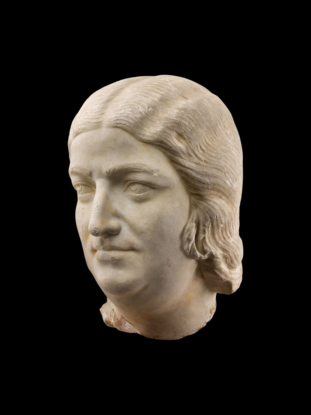 View full screen - View 1 of Lot 21. A Roman Marble Portrait Head of a Woman, Severan, circa 220 A.D..