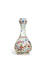 A very rare wucai 'dragon' garlic-mouth vase, Mark and period of Wanli | 明萬曆 五彩穿花龍紋蒜頭瓶 《大明萬曆年製》款