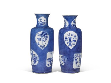 View full screen - View 1 of Lot 123. A pair of powder-blue and blue and white rouleau vases, Qing dynasty, Kangxi Period | 清康熙 灑藍地花鳥博古紋大瓶一對.