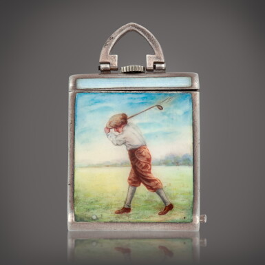 View full screen - View 1 of Lot 332. Retailed by Bucherer: A silver and enamel keyless desk watch with sliding cover | Circa 1938.