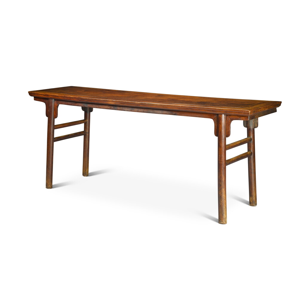 View full screen - View 1 of Lot 128. A 'huanghuali' recessed-leg table (Hua'an), Late Ming dynasty | 明末 黃花梨夾頭榫畫案.