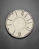 A large calligraphic Samanid pottery dish, Nishapur or Samarqand, 10th century
