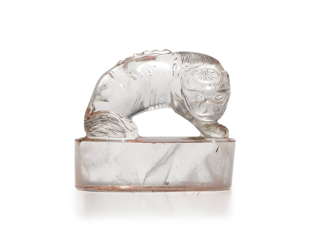 View full screen - View 1 of Lot 104. A rock crystal seal, Qing dynasty, 18th/19th century | 清十八/十九世紀 水晶雕獅鈕印.