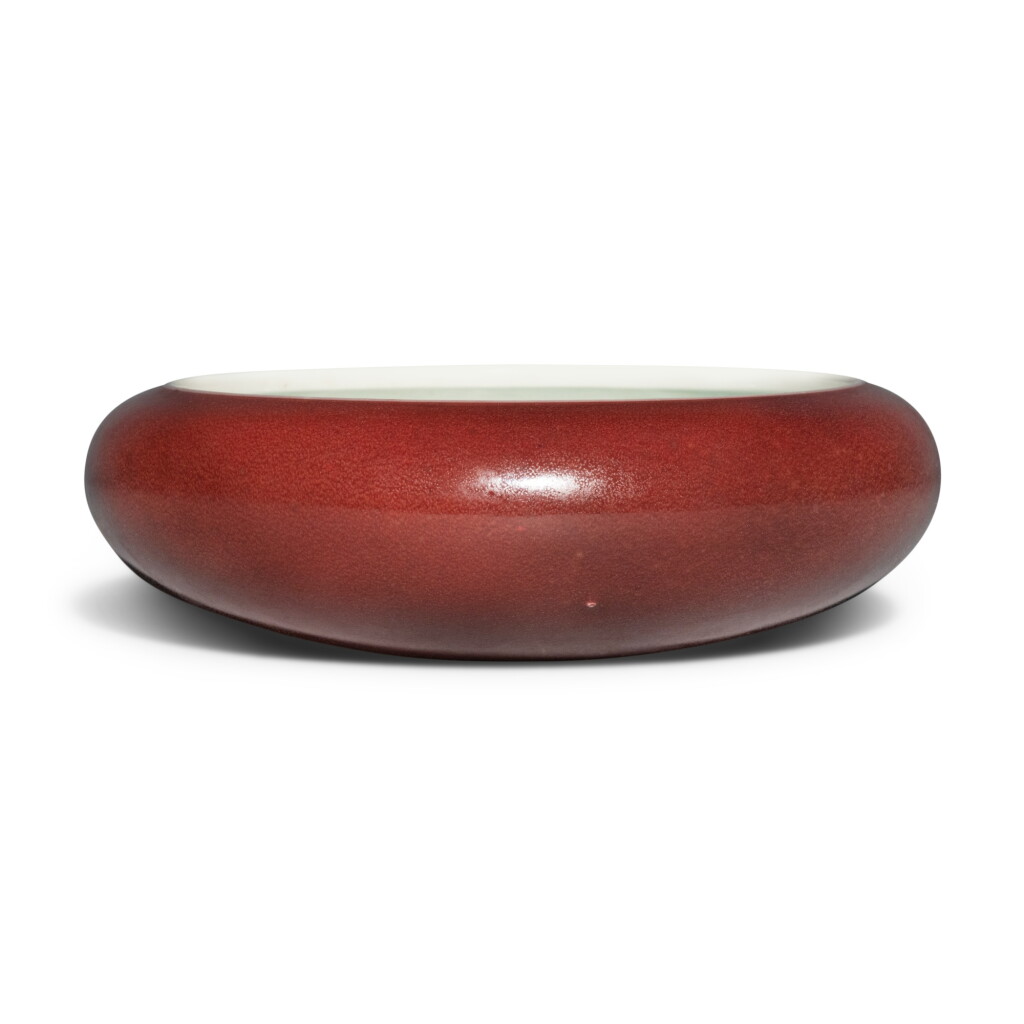 View full screen - View 1 of Lot 605. A copper-red-glazed washer, Qing dynasty, 19th century | 清十九世紀 紅釉洗.