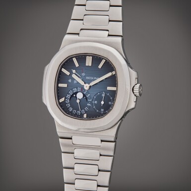 View full screen - View 1 of Lot 23. Reference 5712/1A-001 Nautilus | A stainless steel bracelet watch with date, moon phases and power reserve indication, Circa 2008.