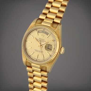 View full screen - View 1 of Lot 36. Day-Date, Reference 18038 | A yellow gold wristwatch with day, date and bracelet | Circa 1982.