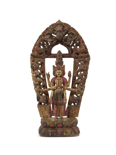 View full screen - View 1 of Lot 5026. A polychrome wood figure of Eleven-Headed Guanyin Late Ming dynasty 明末 木雕加彩十一面觀音像.