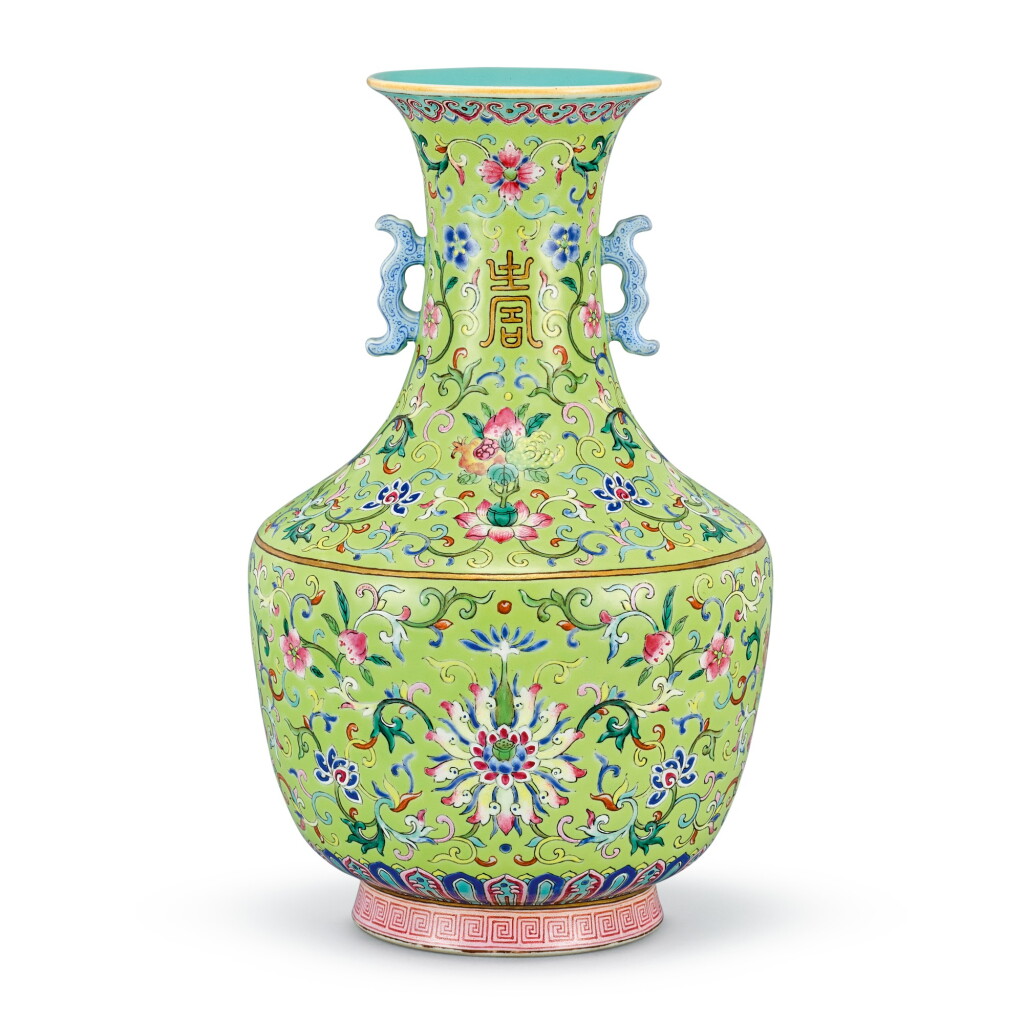 View full screen - View 1 of Lot 365. A lime-green ground famille-rose 'sanduo' bottle vase Seal mark and period of Daoguang | 清道光 淺綠地粉彩三多蓮紋雙耳瓶 《大清道光年製》款.