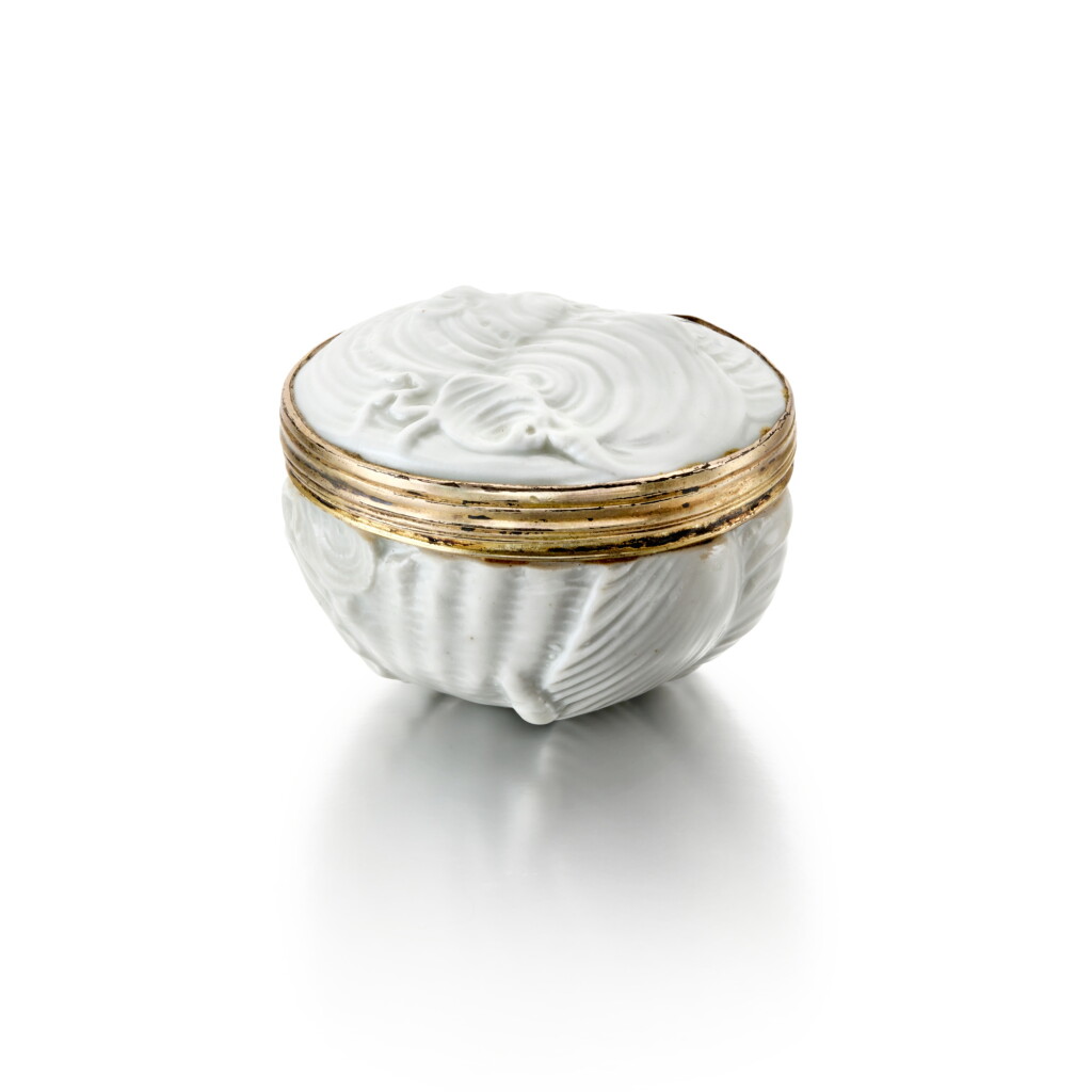 View full screen - View 1 of Lot 325. A Doccia white porcelain shell-shaped silver-gilt-mounted snuff box, circa 1750.