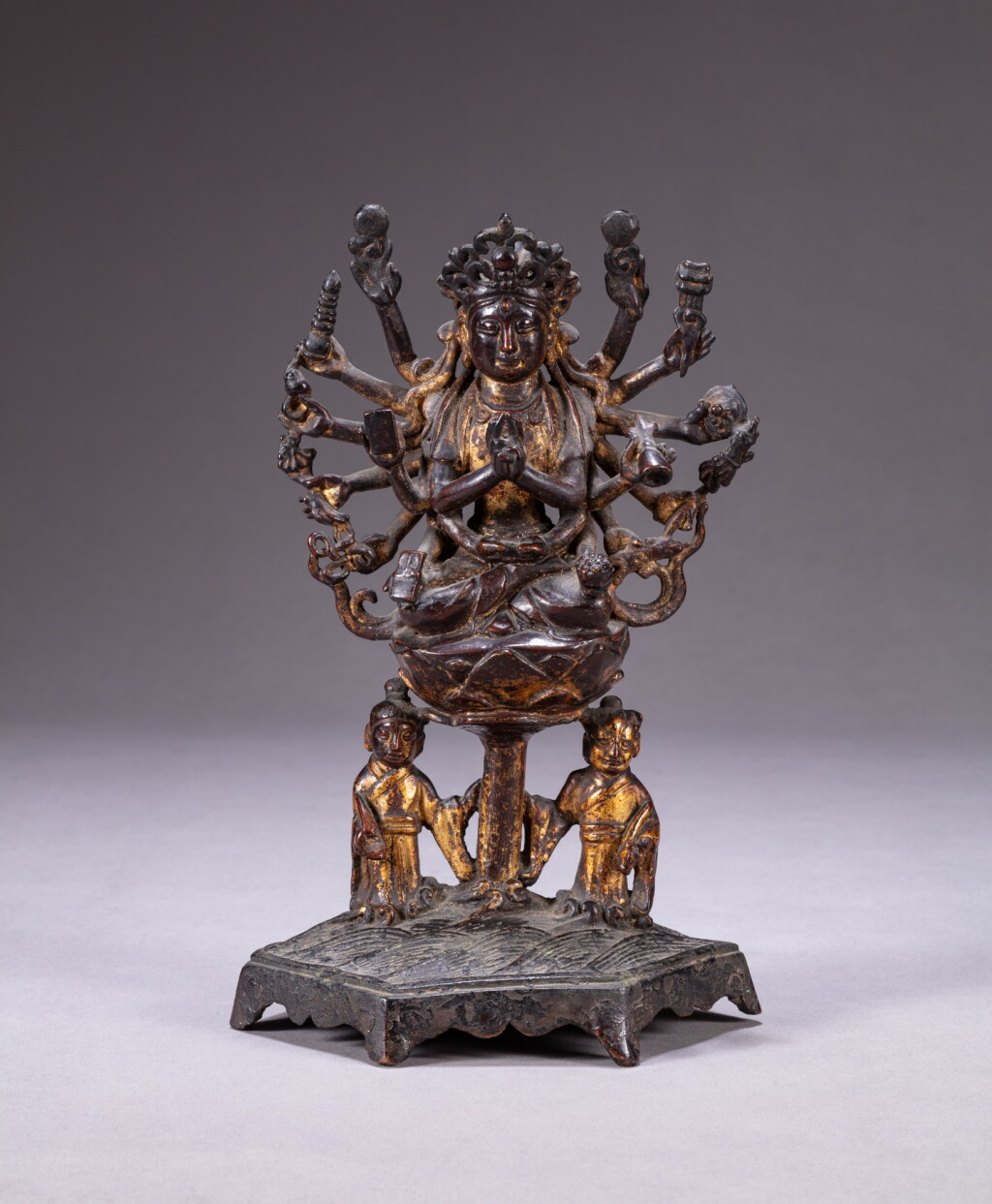 View full screen - View 1 of Lot 104. A gilt-lacquer bronze figure of multi-armed Marichi, Goddess of Dawn, Late Ming dynasty | 明末 銅漆金摩利支天菩薩坐像.