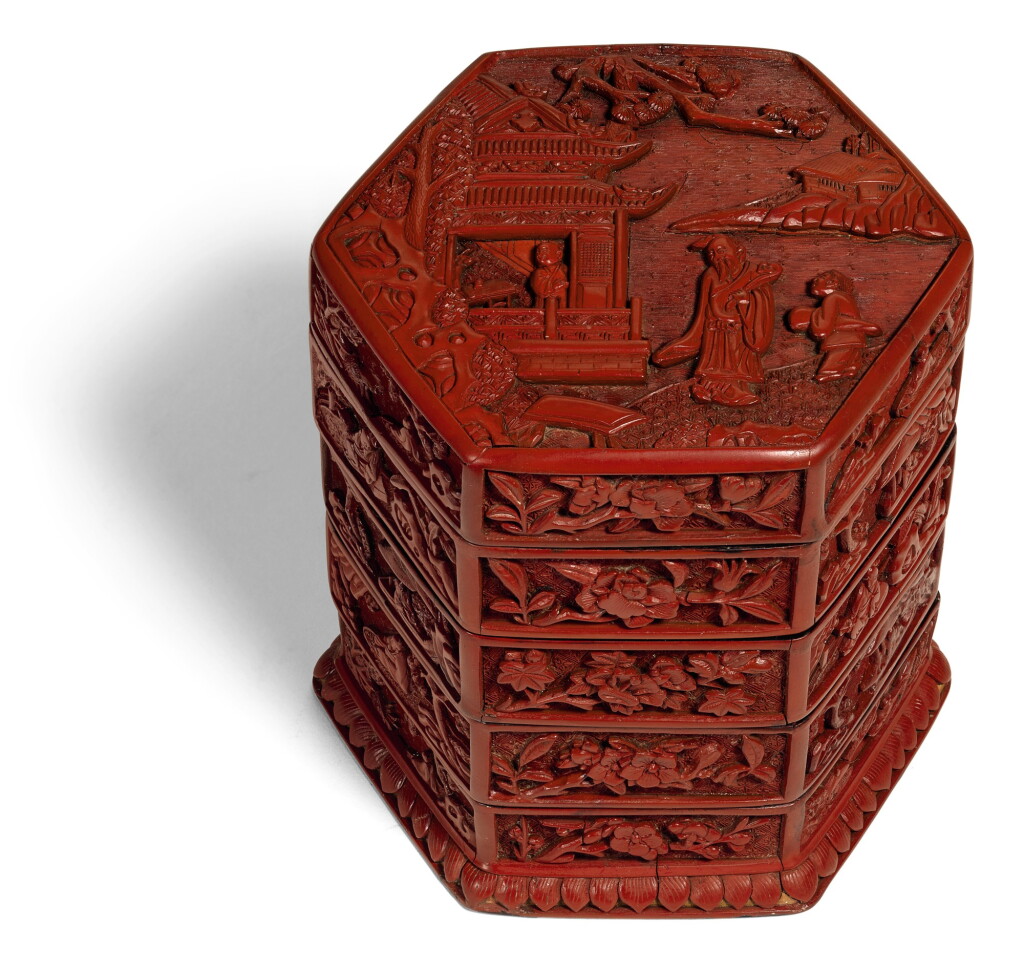 View full screen - View 1 of Lot 141. A CARVED CINNABAR LACQUER TIERED BOX AND COVER MING DYANSTY, 16TH CENTURY | 明十六世紀 剔紅庭院高士圖四層六方蓋盒.