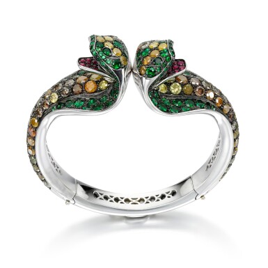 View full screen - View 1 of Lot 296. ATTRIBUTED TO PAOLO PIOVAN | TSAVORITE, RUBY AND DIAMOND BANGLE.