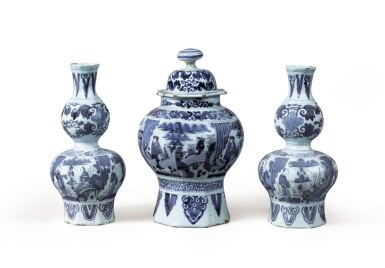 View full screen - View 1 of Lot 128. A pair of Dutch Delft blue and white chinoiserie onion-necked vases and a baluster vase and cover, circa 1700.
