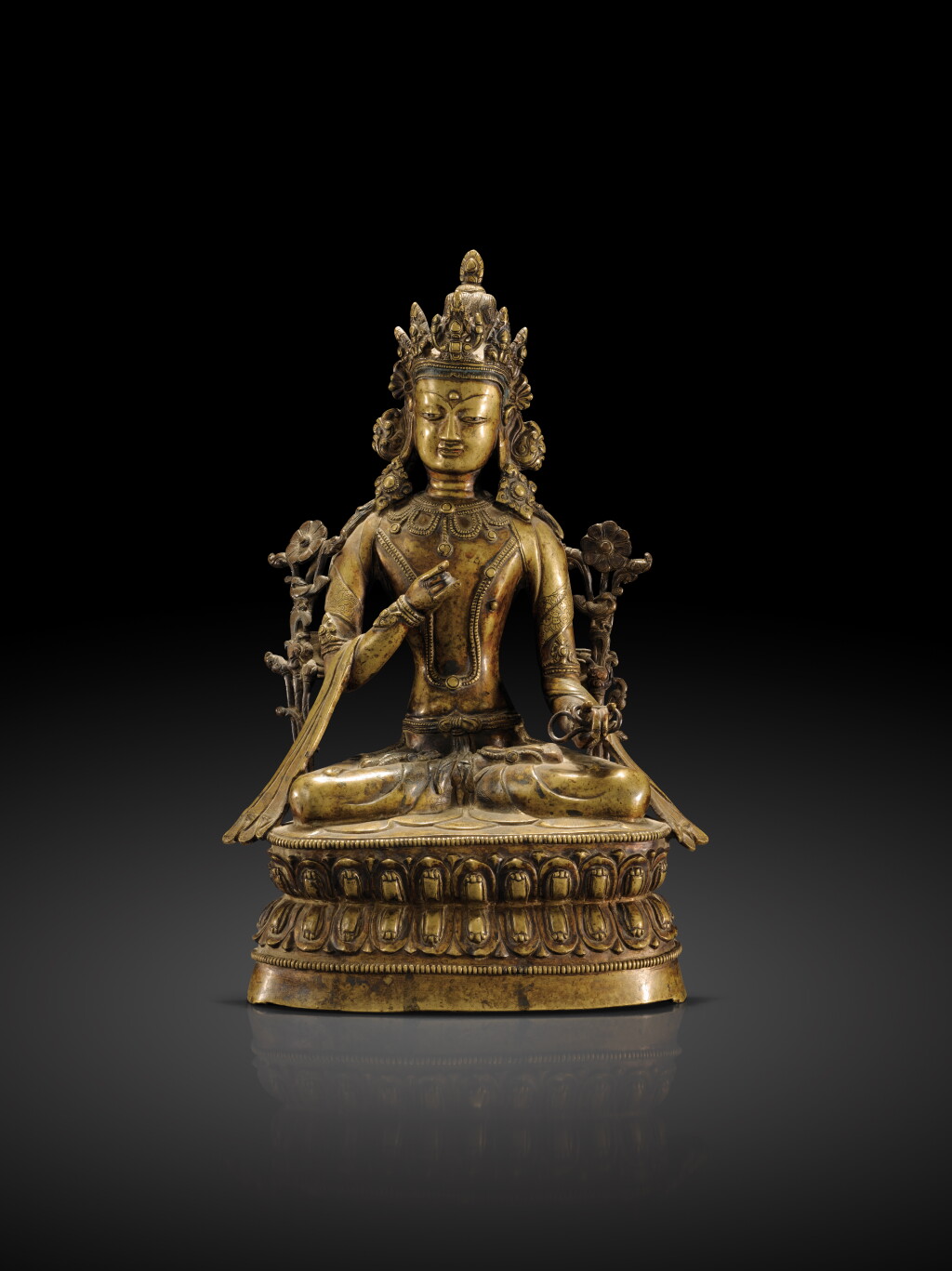 View full screen - View 1 of Lot 37. A copper alloy figure of a Bön deity, Tibet, 16th century | 十六世紀 藏傳銅合金苯教佛坐像.