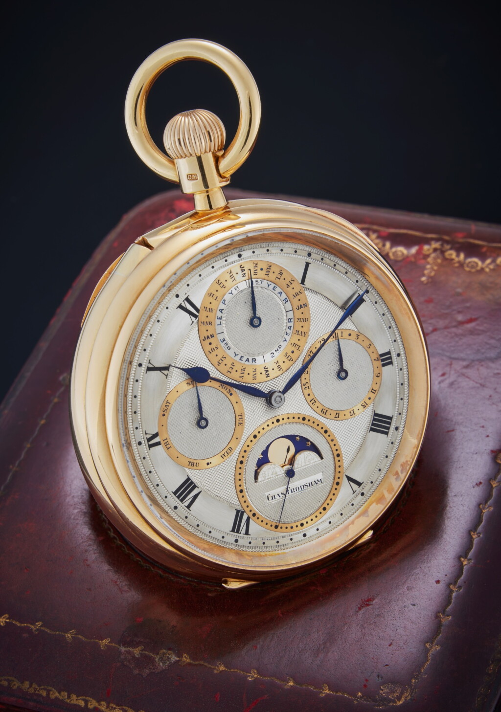 View full screen - View 1 of Lot 43. A historically important and massive yellow gold open-faced keyless one-minute tourbillon, grande sonnerie clock-watch with trip minute repetition, perpetual calendar and moon phases, No. 09572, 1915-16.