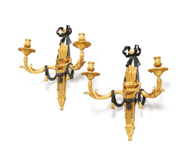View full screen - View 1 of Lot 97. A pair of Louis XVI style gilt-bronze patinated wall appliques | Paire d'appliques en bronze patiné et doré de style Louis XVI.