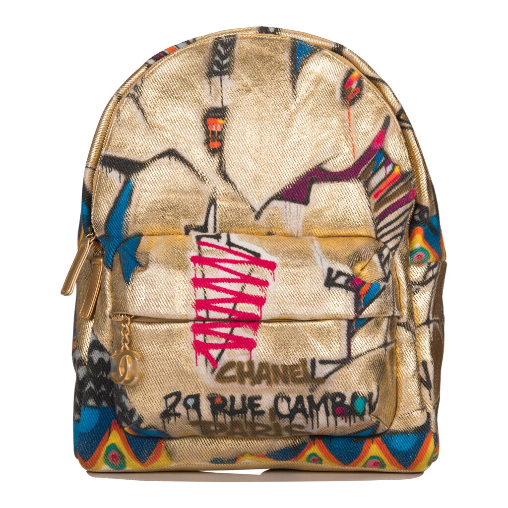 View full screen - View 1 of Lot 115. Chanel Gold Graffiti Printed "Street Spirit" Backpack of Canvas with Gold Tone Hardware.
