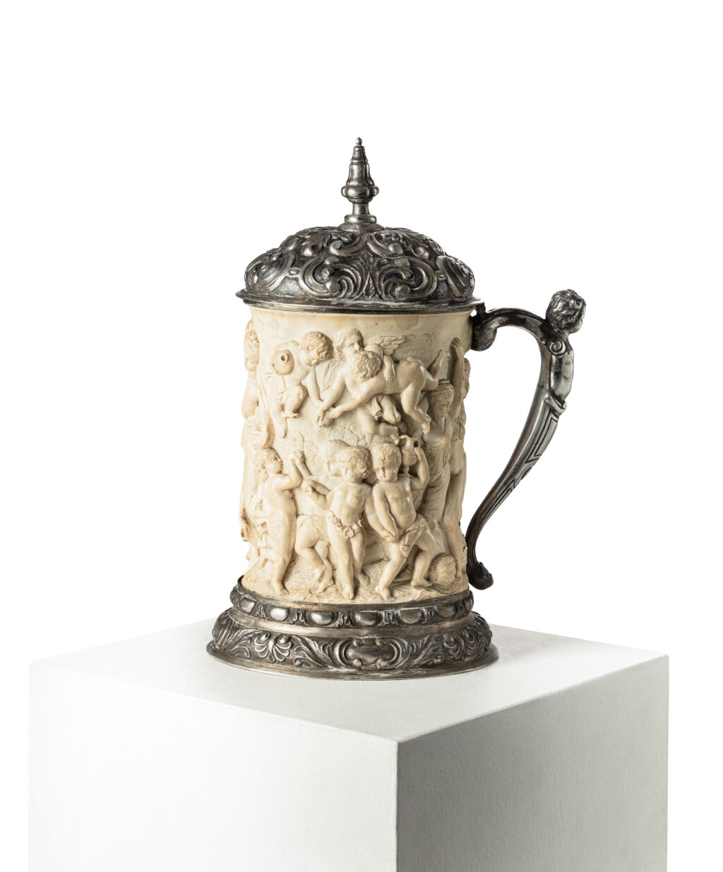 View full screen - View 1 of Lot 78. A German silver-mounted ivory tankard, late 19th century .