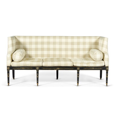 View full screen - View 1 of Lot 60. A late George III gilt-heightened and black painted caned sofa, circa 1800.
