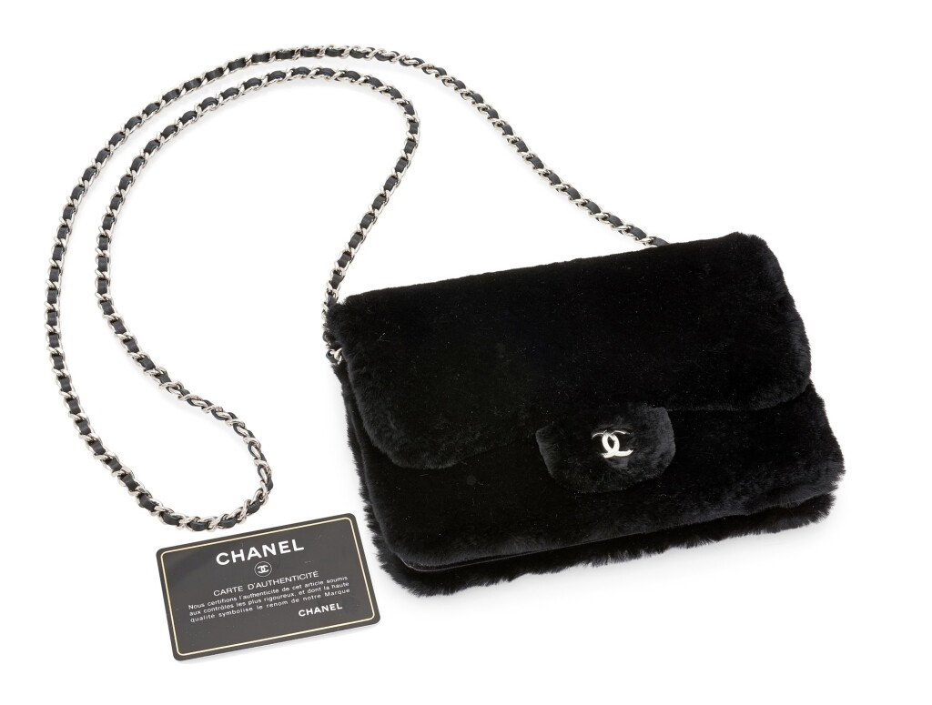 View full screen - View 1 of Lot 24. BLACK LAPIN FUR AND LEATHER WITH SILVER-TONE METAL WALLET ON CHAIN, CHANEL.