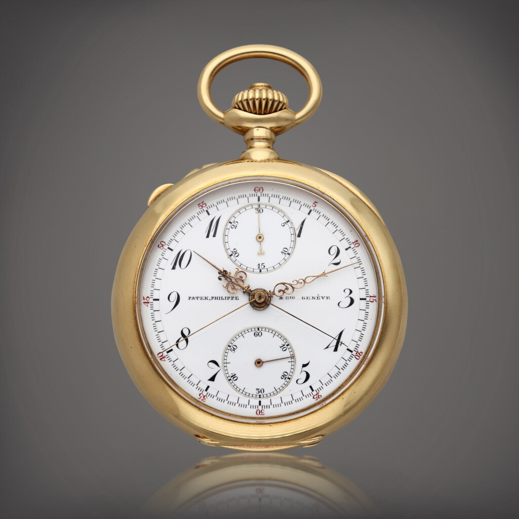 View full screen - View 1 of Lot 311. A yellow gold split second chronograph open faced watch, Circa 1910.