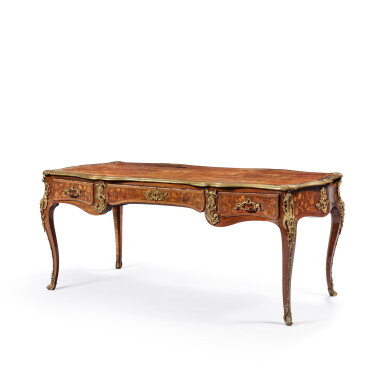 View full screen - View 1 of Lot 70. A Louis XV gilt-bronze mounted walnut, tinted maple, whitebeam, amaranth and holly-strung marquetry bureau plat, circa 1750, stamped by Léonard Boudin.
