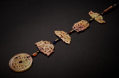View full screen - View 1 of Lot 948. An exceptionally rare group of six jade pendants, Eastern Zhou dynasty, Warring States period | 東周戰國 玉組珮一組六件.