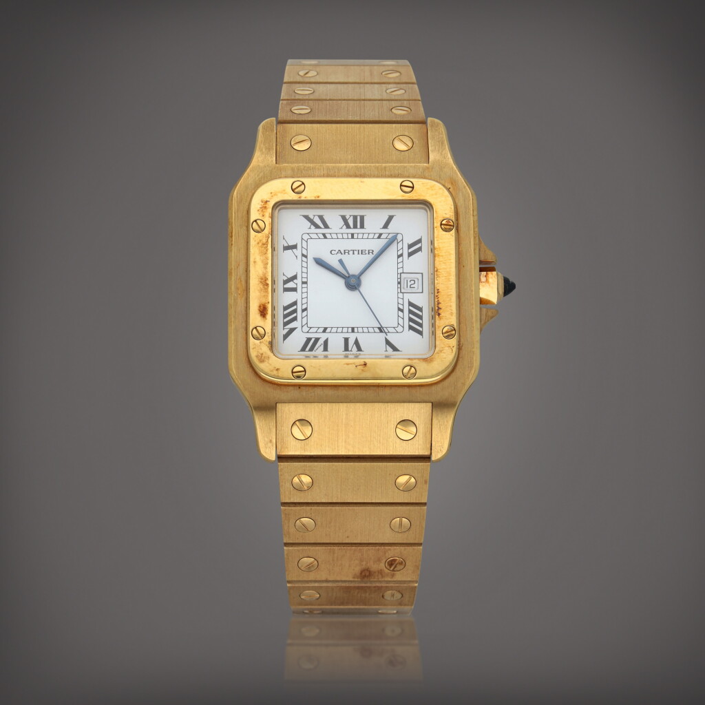 View full screen - View 1 of Lot 591. Santos | A yellow gold wristwatch with date and bracelet | Circa 2000.