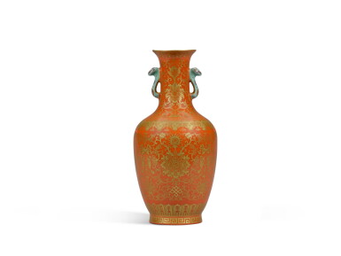 View full screen - View 1 of Lot 128. A gilt-decorated coral-red baluster vase | 珊瑚紅地描金纏枝蓮紋雙耳瓶.