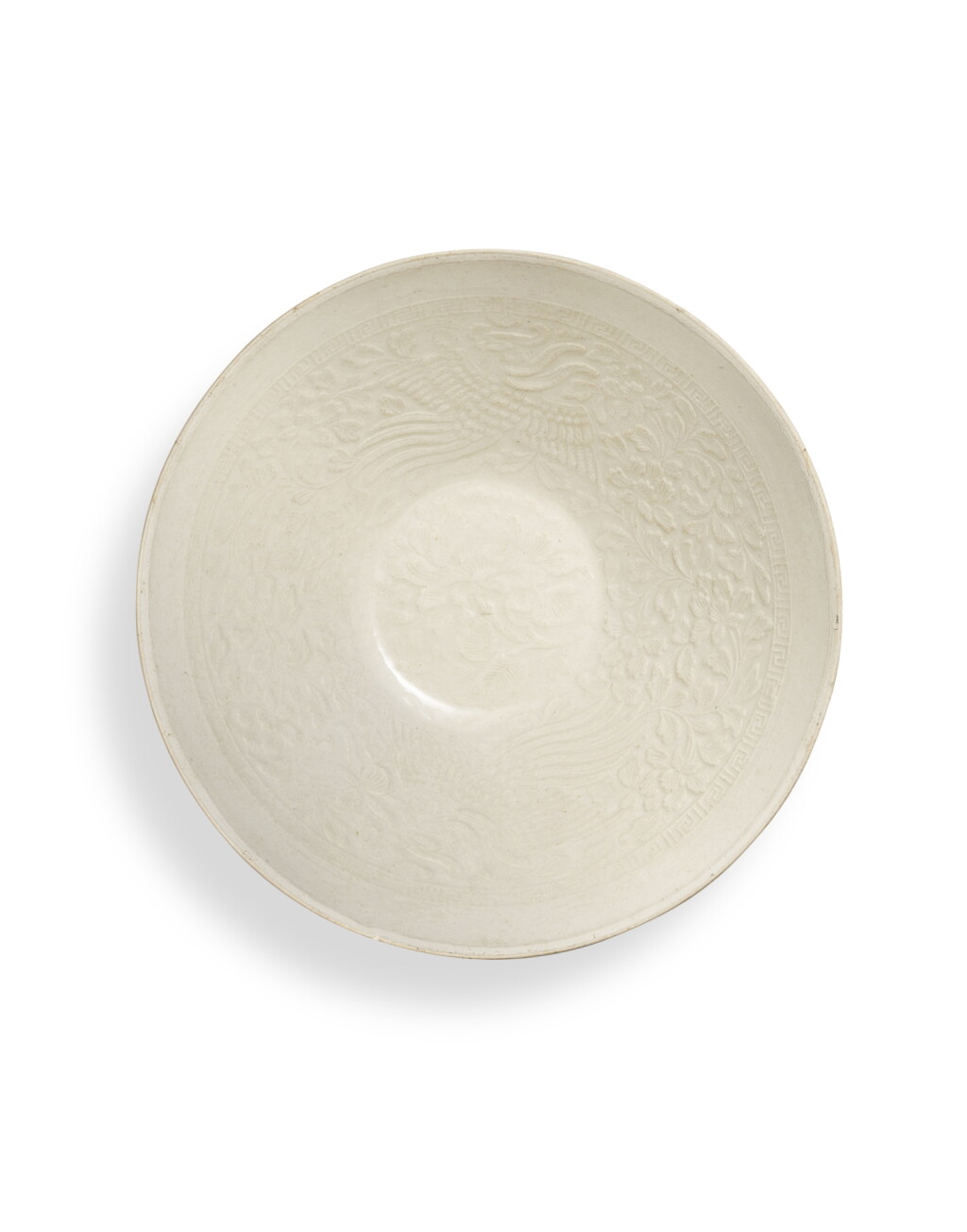 View full screen - View 1 of Lot 5029. A moulded Ding-type 'phoenix' bowl, Northern Song dynasty | 北宋 仿定窰白釉印鳳凰牡丹紋盌.
