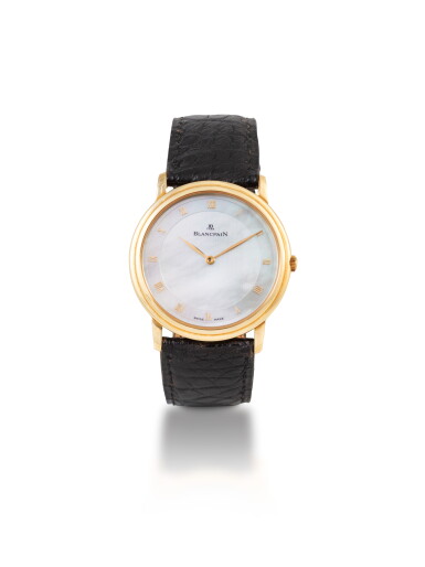View full screen - View 1 of Lot 56. Villeret Montre bracelet en or jaune avec cadran en nacre | Yellow gold wristwatch with mother-of-pearl dial Vers 1995 | Circa 1995.