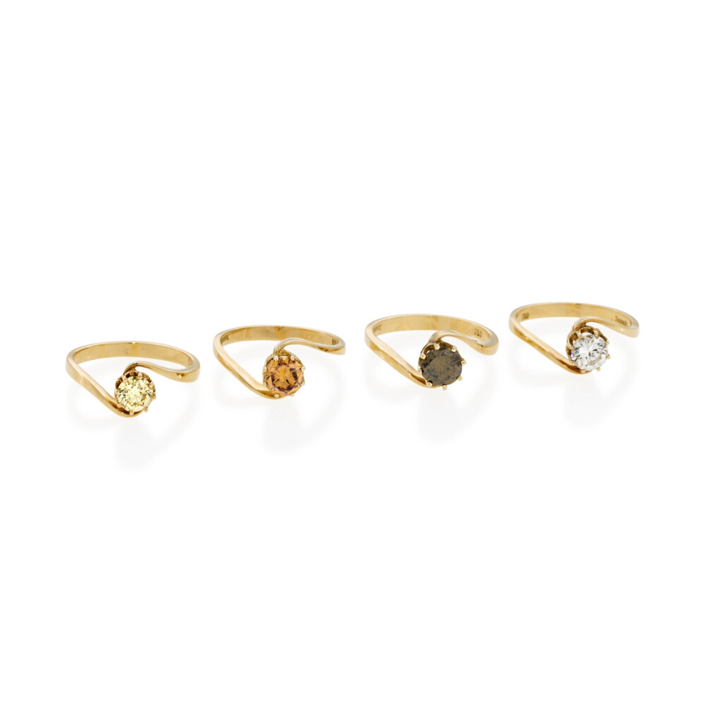 View full screen - View 1 of Lot 113. Set of four matching diamond and coloured diamond rings.