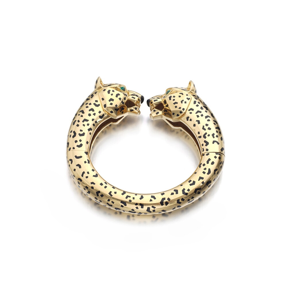 View full screen - View 1 of Lot 878. Gold, enamel and emerald bangle.