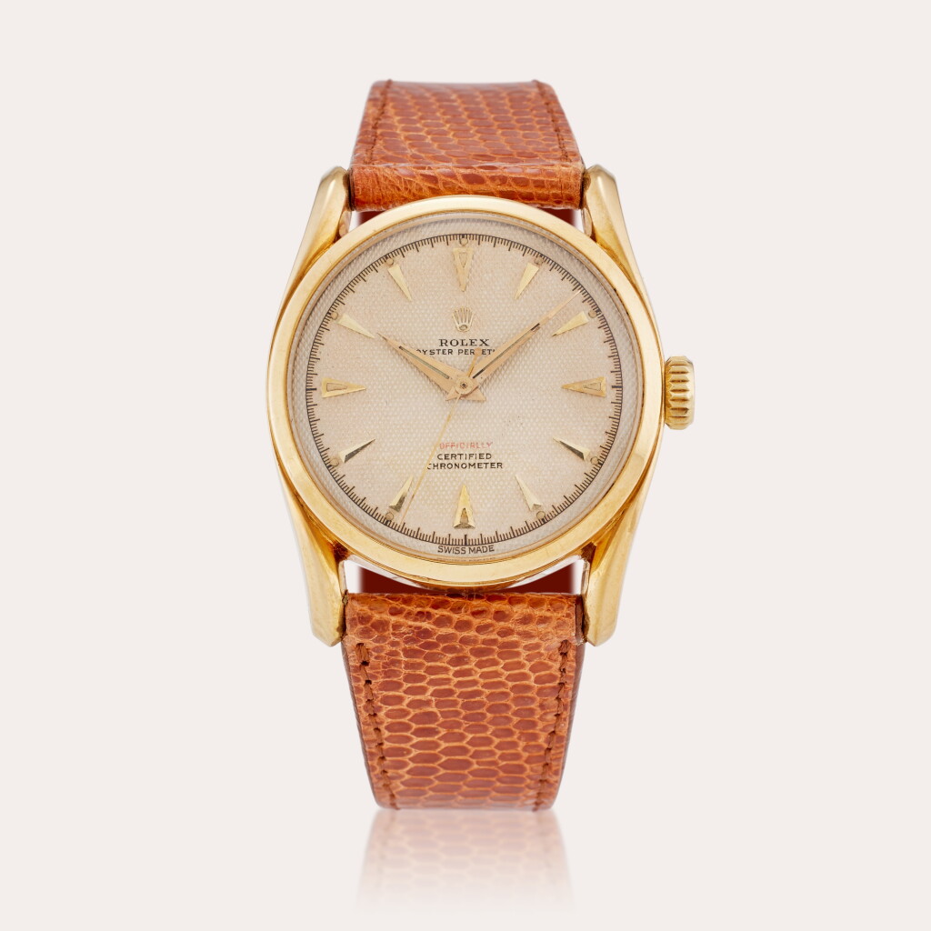 View full screen - View 1 of Lot 461. Reference 6090 Oyster Perpetual | A yellow gold automatic wristwatch, Circa 1963.