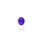 Colour change sapphire and diamond ring