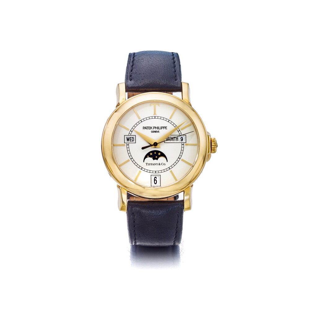 View full screen - View 1 of Lot 995. PATEK PHILIPPE | REF 5150 T-150 RETAILED BY TIFFANY & CO.: A LIMITED EDITION YELLOW GOLD AUTOMATIC ANNUAL CALENDAR WRISTWATCH WITH MOON PHASES MADE TO COMMEMORATE THE 150TH ANNIVERSARY OF THE RELATIONSHIP BETWEEN PATEK PHILIPPE AND TIFFANY & CO. CIRCA 2001 | 百達翡麗 | 零售商為蒂芙尼:5150 T-150型號限量版黃金自動上鏈年曆腕錶備月相顯示,為紀念百達翡麗與蒂芙尼合作150週年製造,年份約2001.