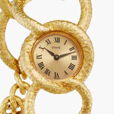 View full screen - View 1 of Lot 47. Reference 3649 D80 Dalí d'Or | A limited edition yellow gold bracelet watch with coin pendant, Circa 1966.