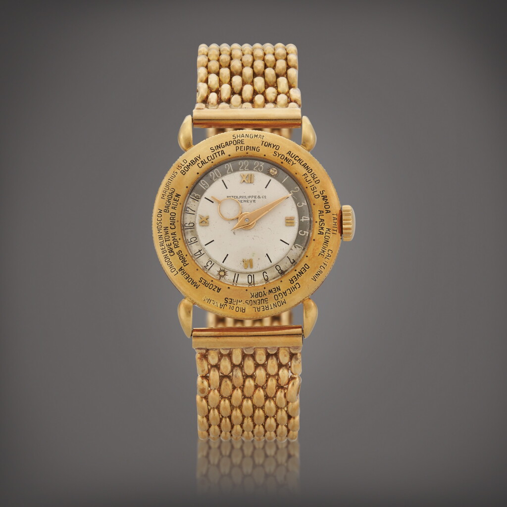 View full screen - View 1 of Lot 93. World Time, Reference 1415 A yellow gold world time wristwatch with bracelet Made in 1942 | 百達翡麗 | World Time 型號 1415 黃金世界時間鍊帶腕錶,製作年份 1942.