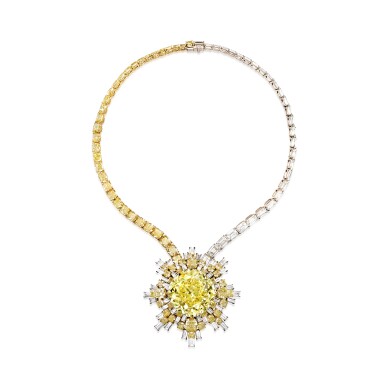 View full screen - View 1 of Lot 87. A Magnificent Fancy Vivid Yellow Diamond and Diamond Pendent Necklace | 超凡至尊【軒轅之星】艷彩黃色鑽石配鑽石項鏈.