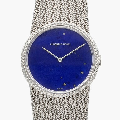View full screen - View 1 of Lot 701. A white gold bracelet watch with lapis lazuli dial, Circa 1970.