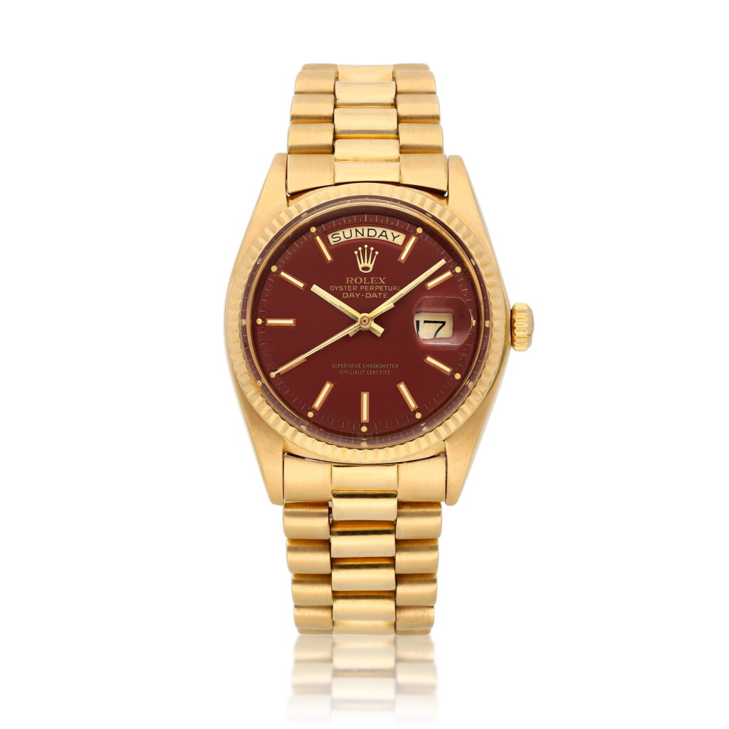 View full screen - View 1 of Lot 10. Stella Dial Day-Date, Ref. 1803 A pink gold wristwatch with day, date, brown tobacco lacquered stella dial and bracelet Circa 1974.