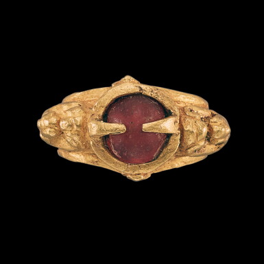 View full screen - View 1 of Lot 3108. A gold-alloy and cabochon red-gem repoussé ring, Champa, 14th century 十四世紀 占城 金合金嵌紅色寶石戒指.