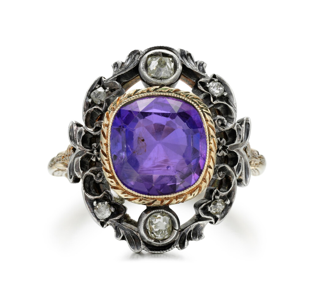 View full screen - View 1 of Lot 104. COLOUR CHANGE SAPPHIRE AND DIAMOND RING.