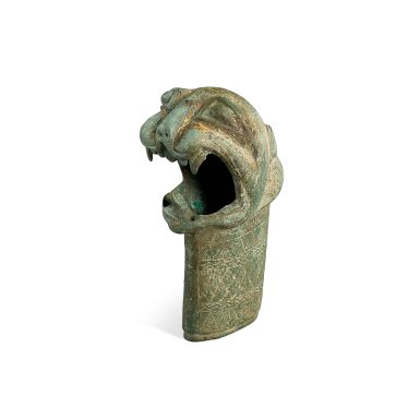 View full screen - View 1 of Lot 513. A gilt-bronze 'tiger' staff finial, Eastern Han dynasty 東漢 銅鎏金虎形杖首.