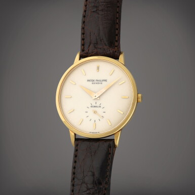 View full screen - View 1 of Lot 64. Retailed by Gübelin: Calatrava, Reference 3893 | A yellow gold wristwatch | Circa 1984.