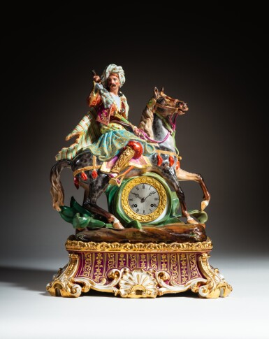 View full screen - View 1 of Lot 132. A Louis-Philippe Limoges (Michel Aaron et Jean-Baptiste Valin) panhellenic porcelain clock case and stand modelled as a horseman, circa 1840.